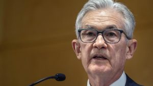 Fed's Powell says inflation is slowing but says more progress is needed
